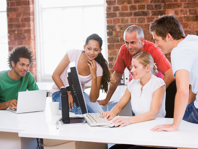 Our partners-a group of five around a table